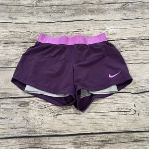 Nike Purple Athletic Shorts with Pink Accents